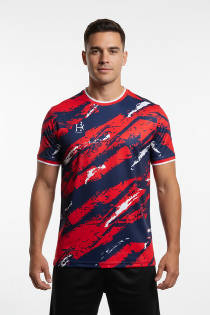 Man wearing a red and blue patterned sports jersey on a white background